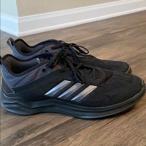 All black adidas tennis shoes